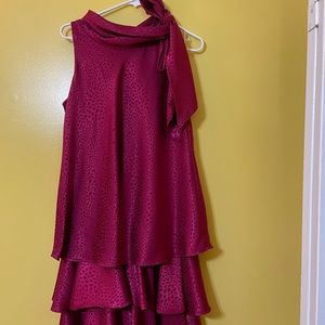 the material of this dress is 10/10!!! 
Color fuchsia fits like a medium!!